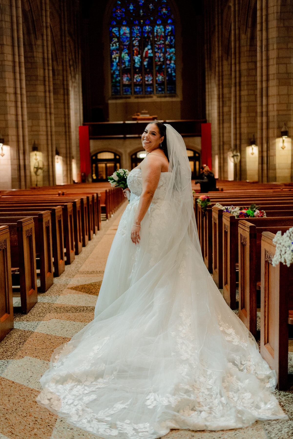 Bride in the cathedral aisle
